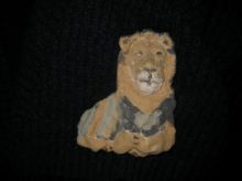 Барельеф "Сидящий лев "