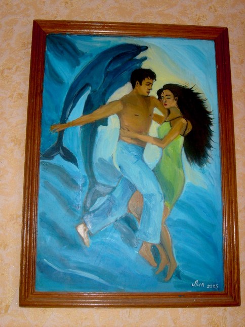 В океане с дельфинами.