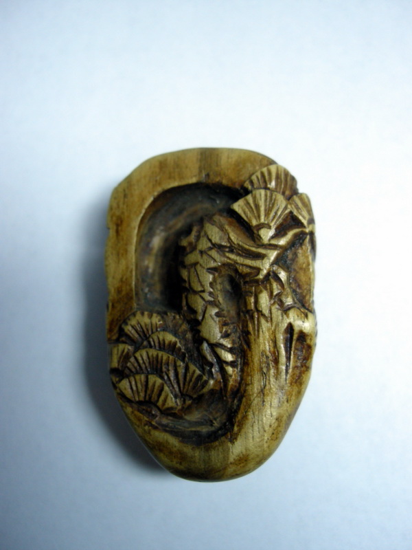 маска Окина (обратная сторона)