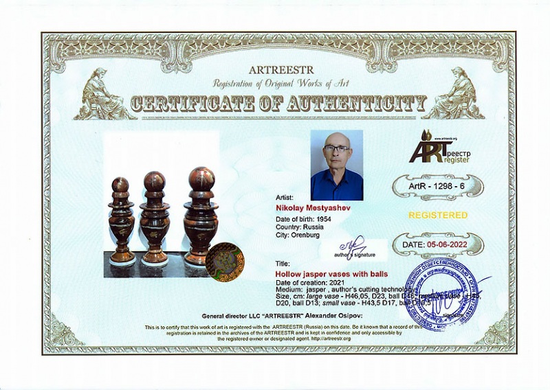 Hollow jasper vases with balls