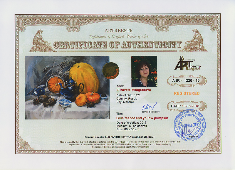 Blue teapot and yellow pumpkin